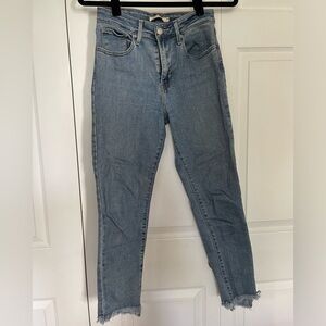 Levi’s 721 High Rise Skinny Jeans Distressed Hem